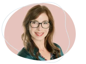 Meet Cheryl Dillon | Equitable Mediation Professional portrait of Cheryl Dillon smiling confidently while seated at a mediation table, symbolizing expertise and empathy. Looking for compassionate guidance through your divorce? Call Equitable Mediation at (877) 732-6682 to connect with Cheryl today.