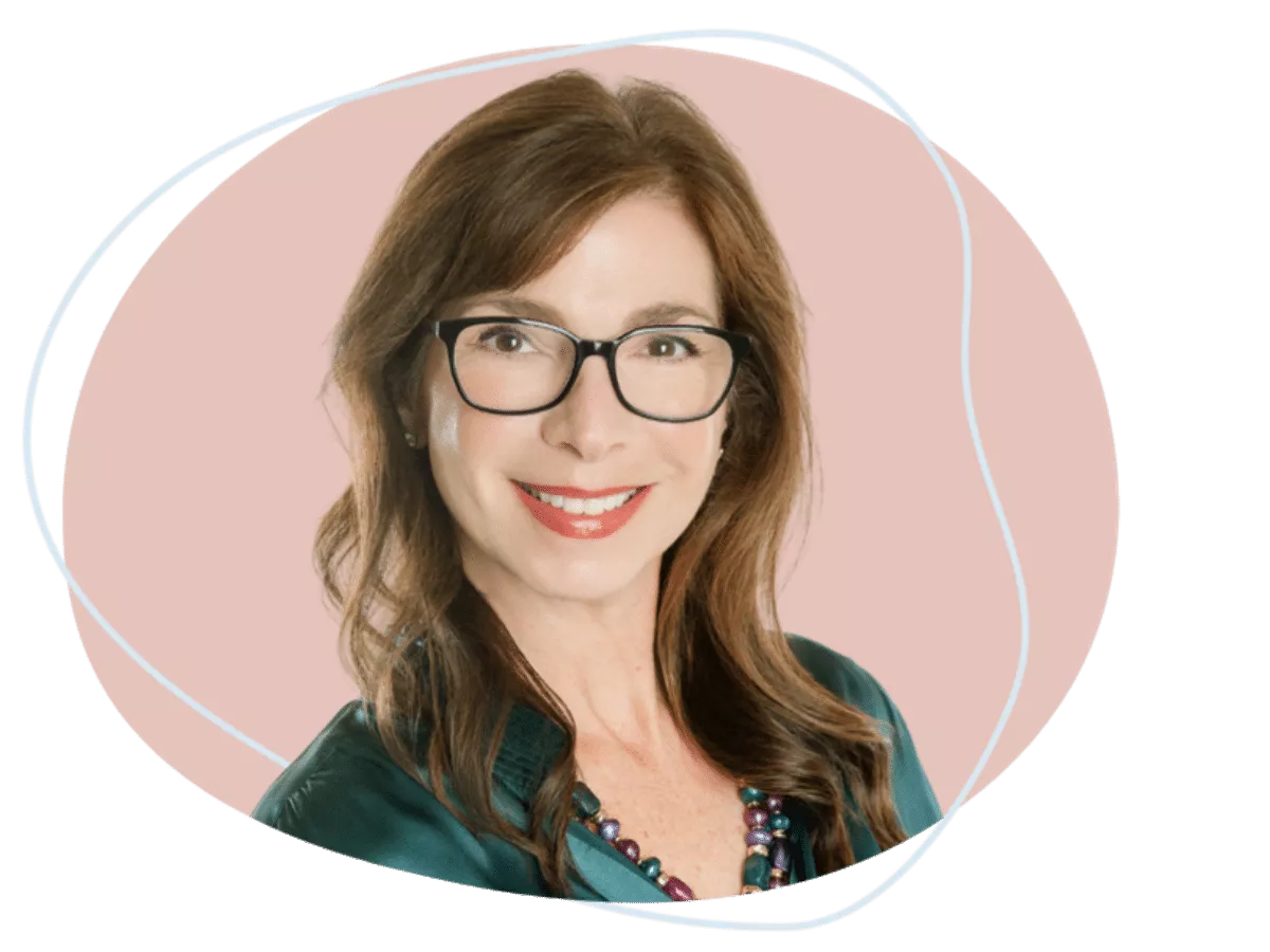 Meet Cheryl Dillon | Equitable Mediation Professional portrait of Cheryl Dillon smiling confidently while seated at a mediation table, symbolizing expertise and empathy. Looking for compassionate guidance through your divorce? Call Equitable Mediation at (877) 732-6682 to connect with Cheryl today.